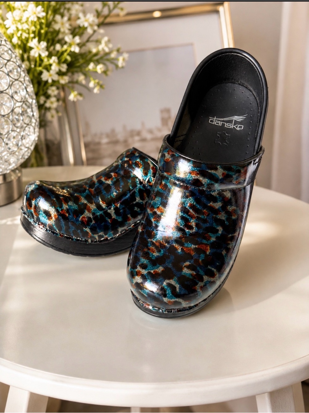 Dansko Patent Leopard-Print Clogs in Black, Teal, Brown